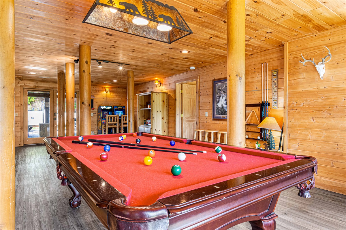 Game Room: Unwind with a classic pool table and rustic charm in a fun-filled atmosphere!