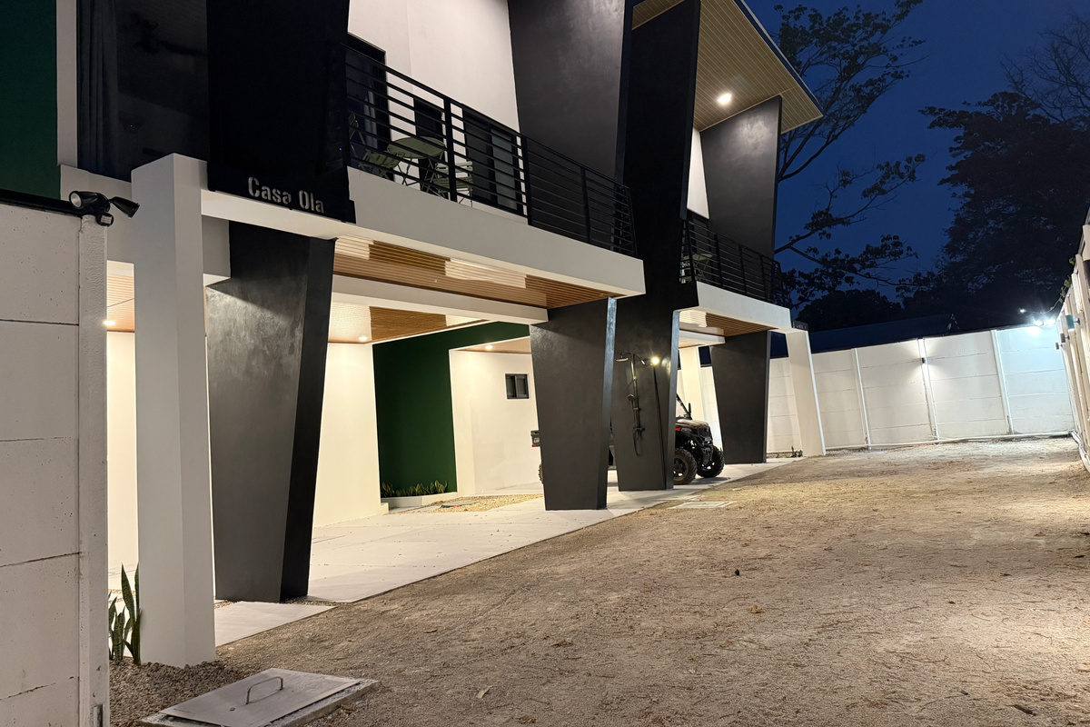 The compound at night. Warm, lit, feels like coming home.