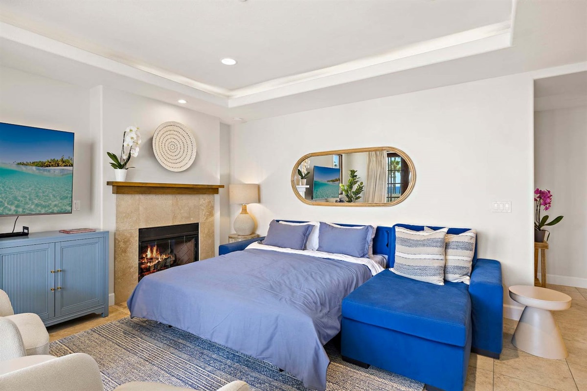 Here is the queen-sized sofa bed extended and setup for sleeping.  Some people prefer sleeping out here so they can hear waves at night.