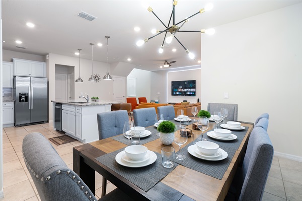 Gather around the elegant dining table in this Florida villa near Disney – seats 8 for fun family meals.