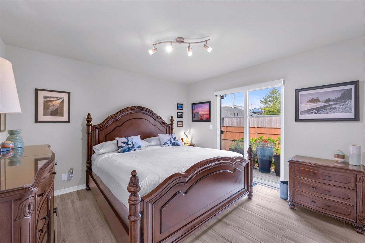 Spread out in comfort on the large king bed with high thread count linens in the downstairs garden bedroom