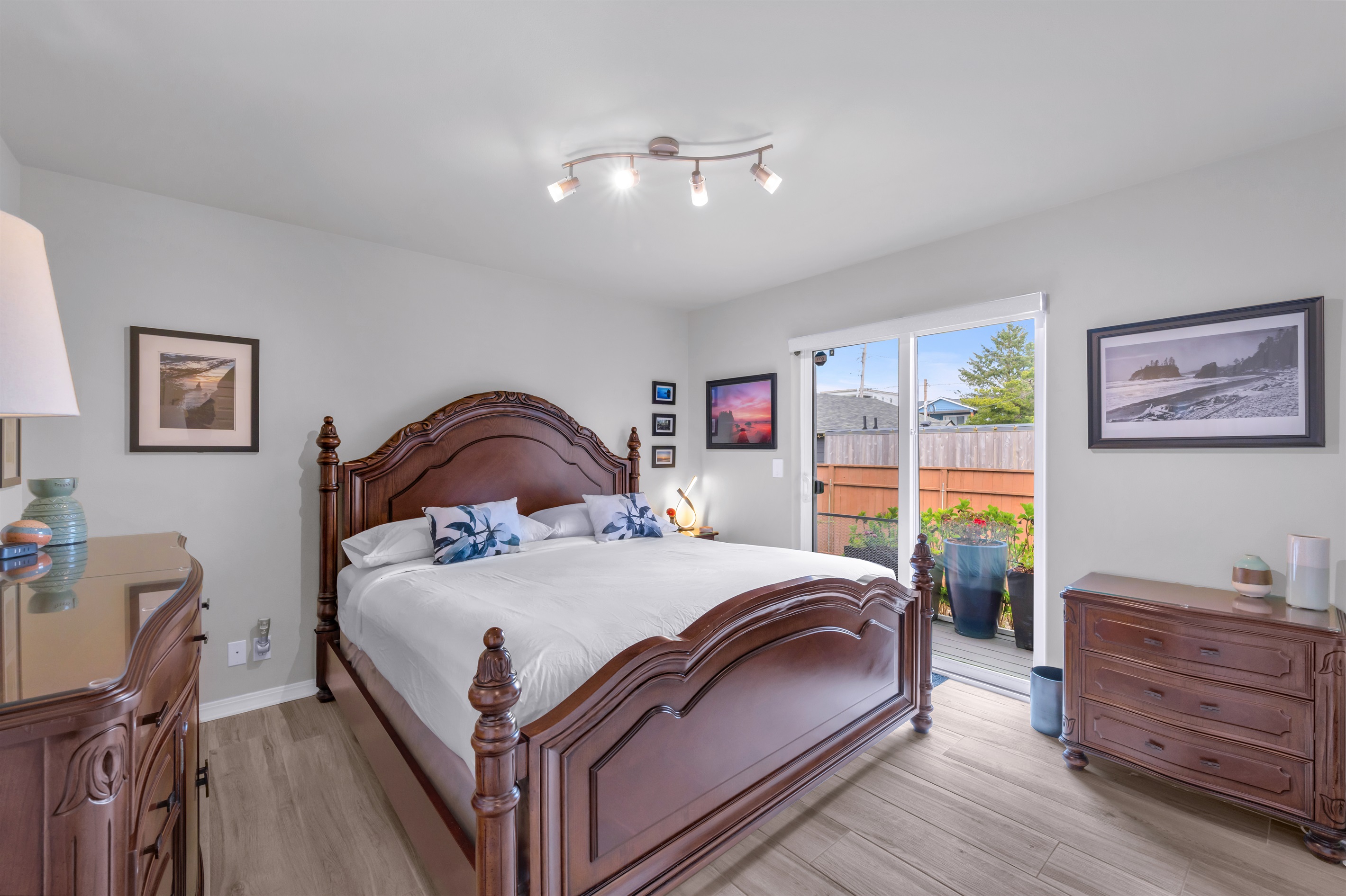Spread out in comfort on the large king bed with high thread count linens in the downstairs garden bedroom