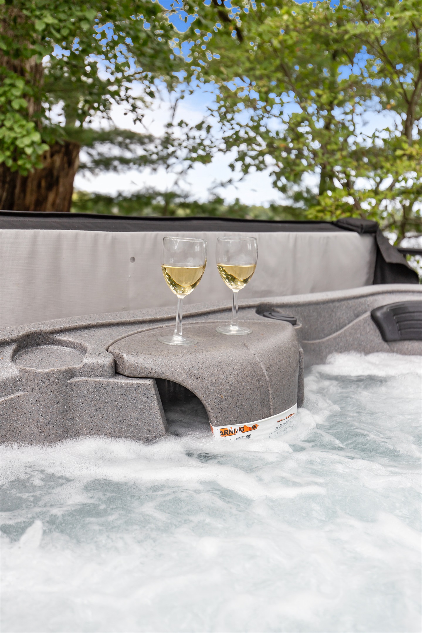 Unwind in the hot tub and let the soothing bubbles melt your stress away.