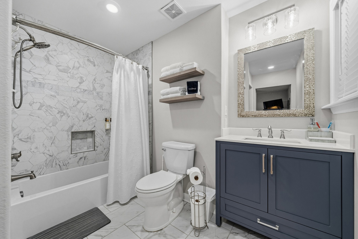 Get ready without the line — three full baths keep ten people moving on a race-day morning.