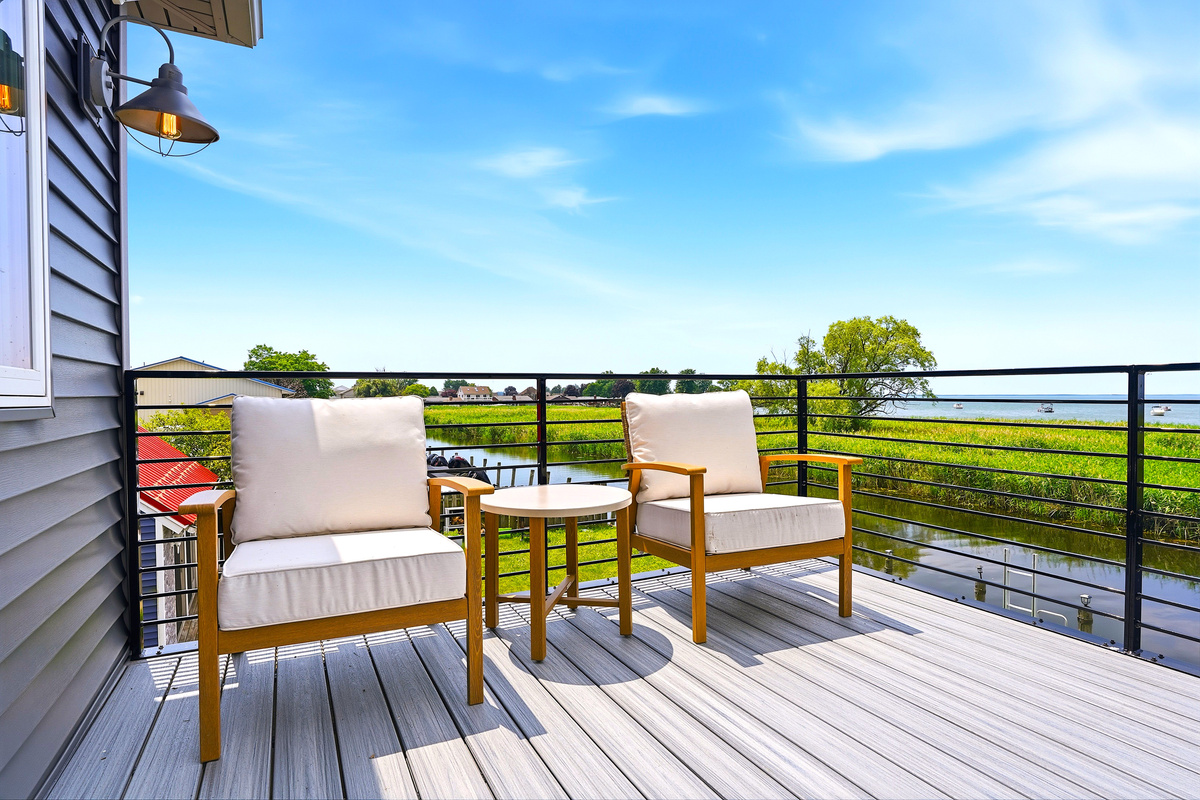 Step onto your private balcony and take in breathtaking views of Lake St. Clair. Whether you're sipping your morning coffee or unwinding with a glass of wine, this peaceful waterfront retreat is yours to enjoy.
