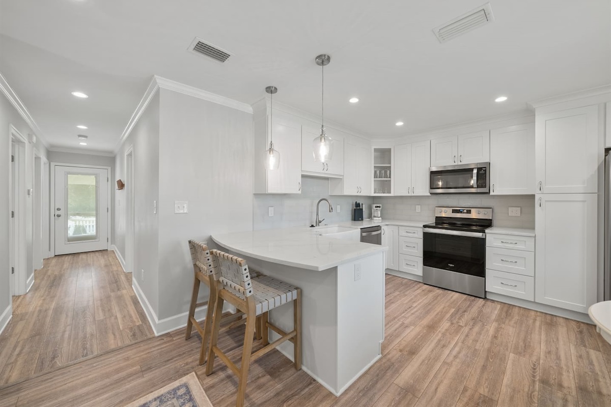 Open concept kitchen of Unit B. 