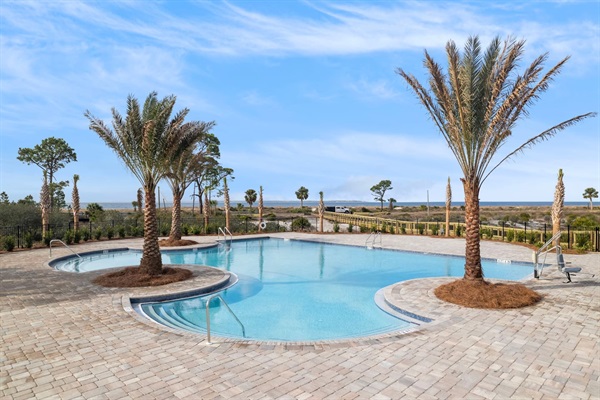 Enjoy the Windmark North pool - a quick 2 min golf cart ride away