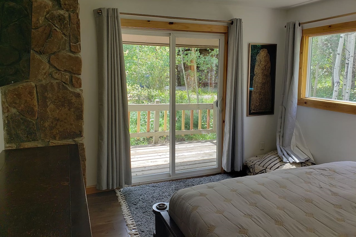 Bedroom 1 with walk out porch. 