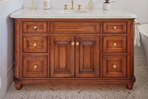 Enjoy getting ready in a beautiful Calacatta marble bathroom featuring a large soaking tub, a spacious glass-enclosed shower, and elegant finishes throughout.