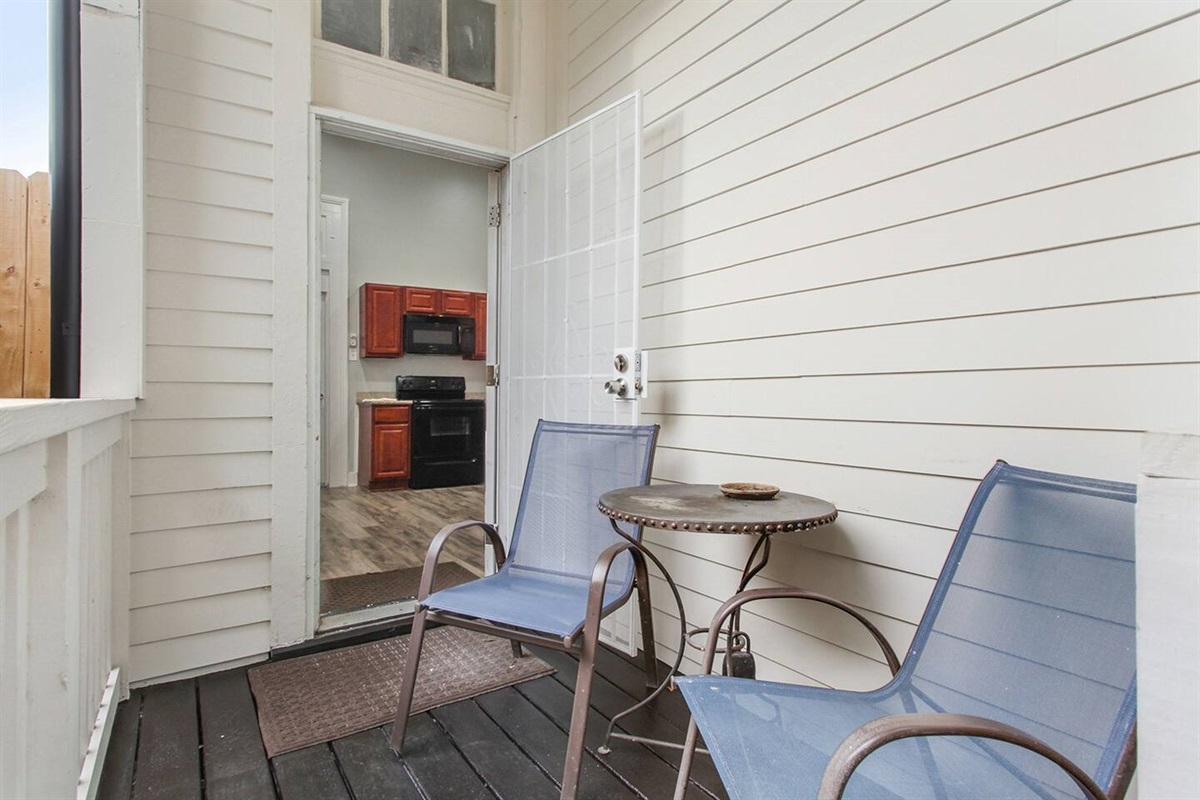 Downstairs back patio.