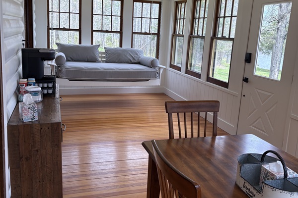 Updated porch with swinging day bed!
