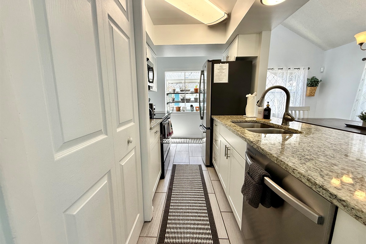 A minimalist, modern aesthetic makes this kitchen a clean and clutter-free space to cook and gather.