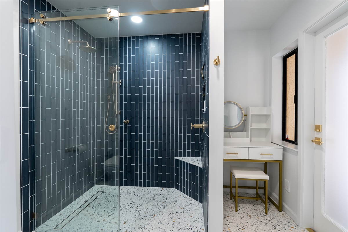 Mid Century Blue A serene blend of bold blue tones and sleek mid-century design, creating a timeless and tranquil bath experience.