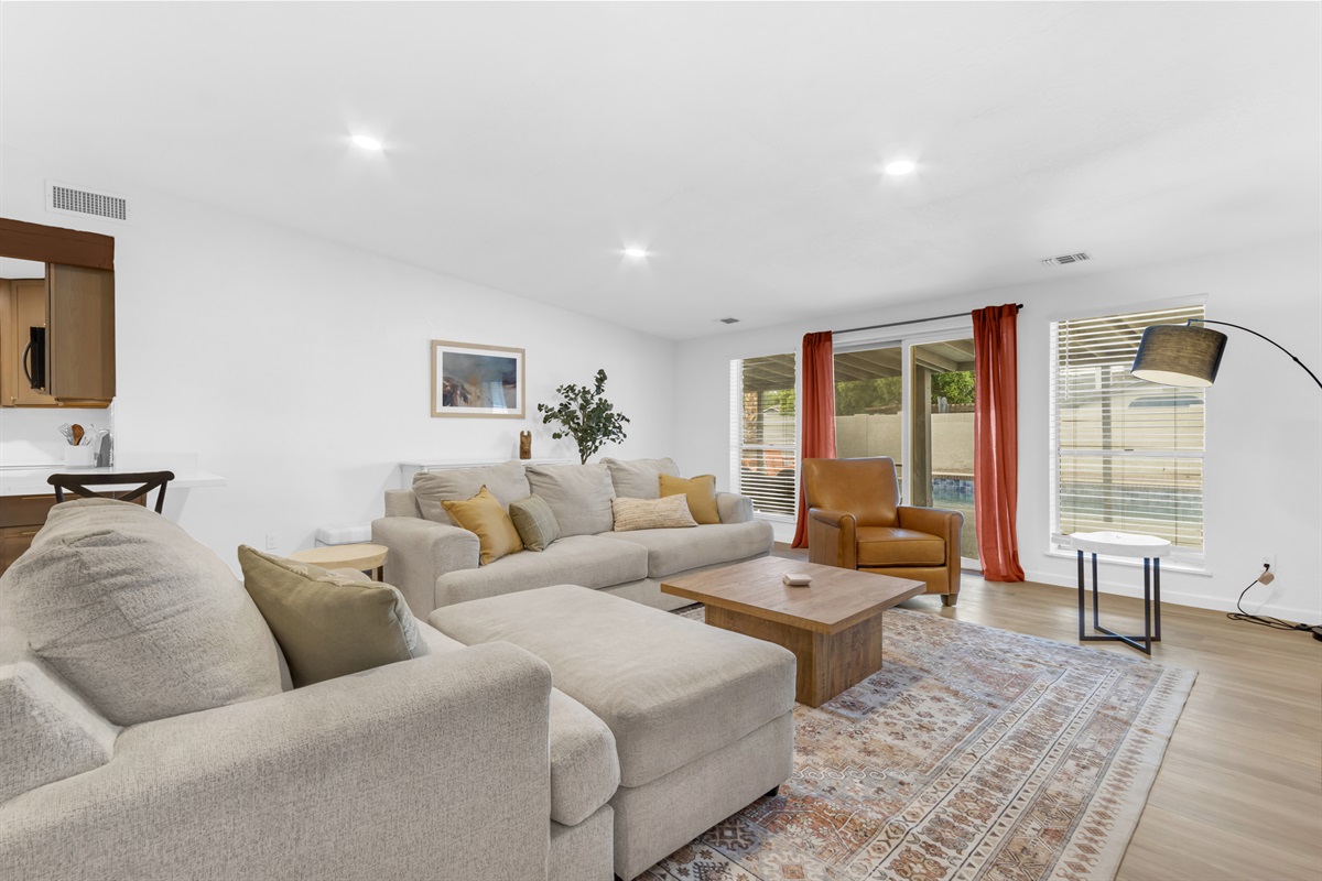 French doors right off the living area for easy pool access