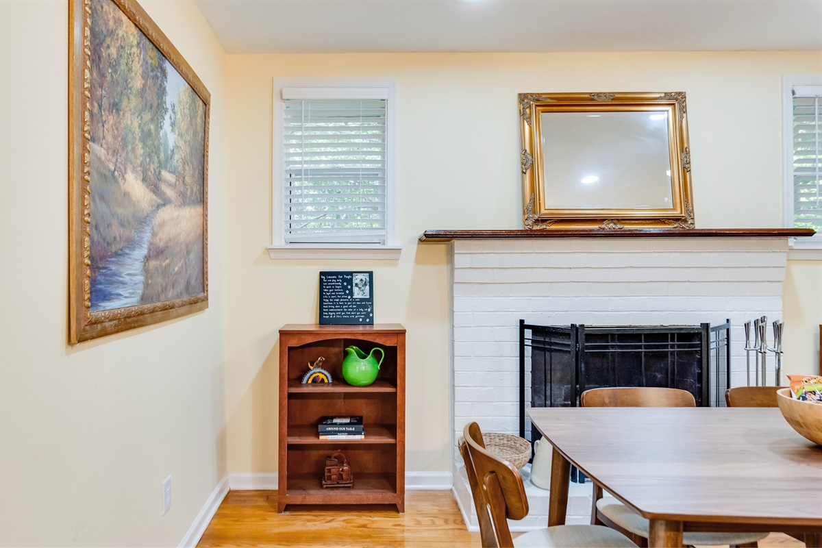 Dining Area: Bright and inviting space with artful decor and a lovely view for memorable meals!