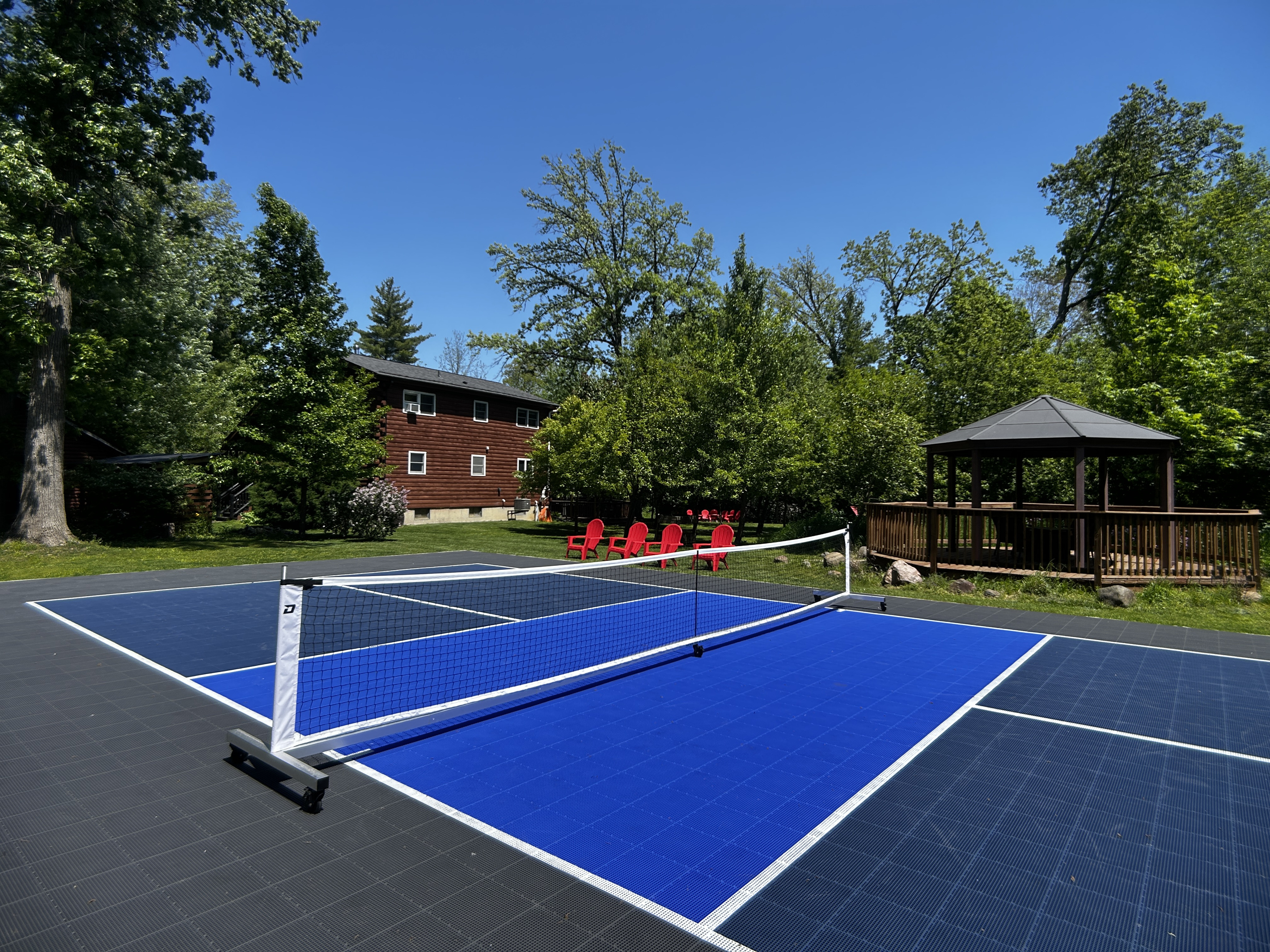 Regulation size pickleball court with Sport Court surface is only shared with guests who book the Guest Quarters.