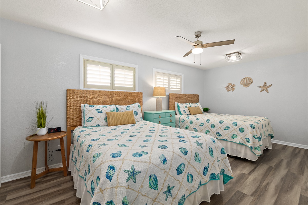 Guest bedroom with 2 Queen beds and coastal charm