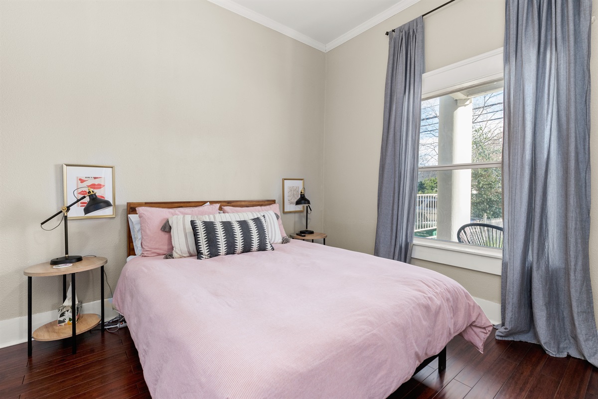 Under a canopy of coziness, this bedroom whispers tales of rest and relaxation. A retreat for the soul, adorned with dreams