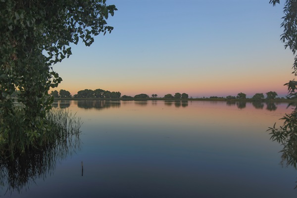 A serene view of the private lake