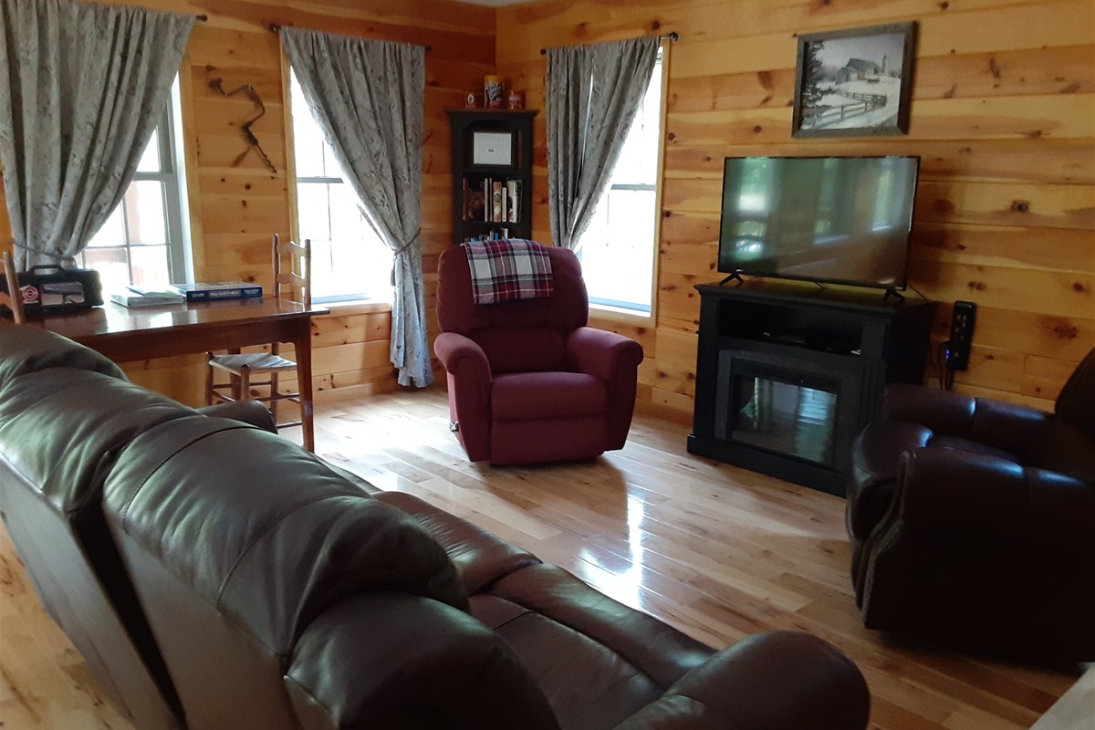 Comfortable seating provides plenty of space for your group to gather, whether you’re watching a movie, playing games, or simply unwinding by the soft glow of the evening.