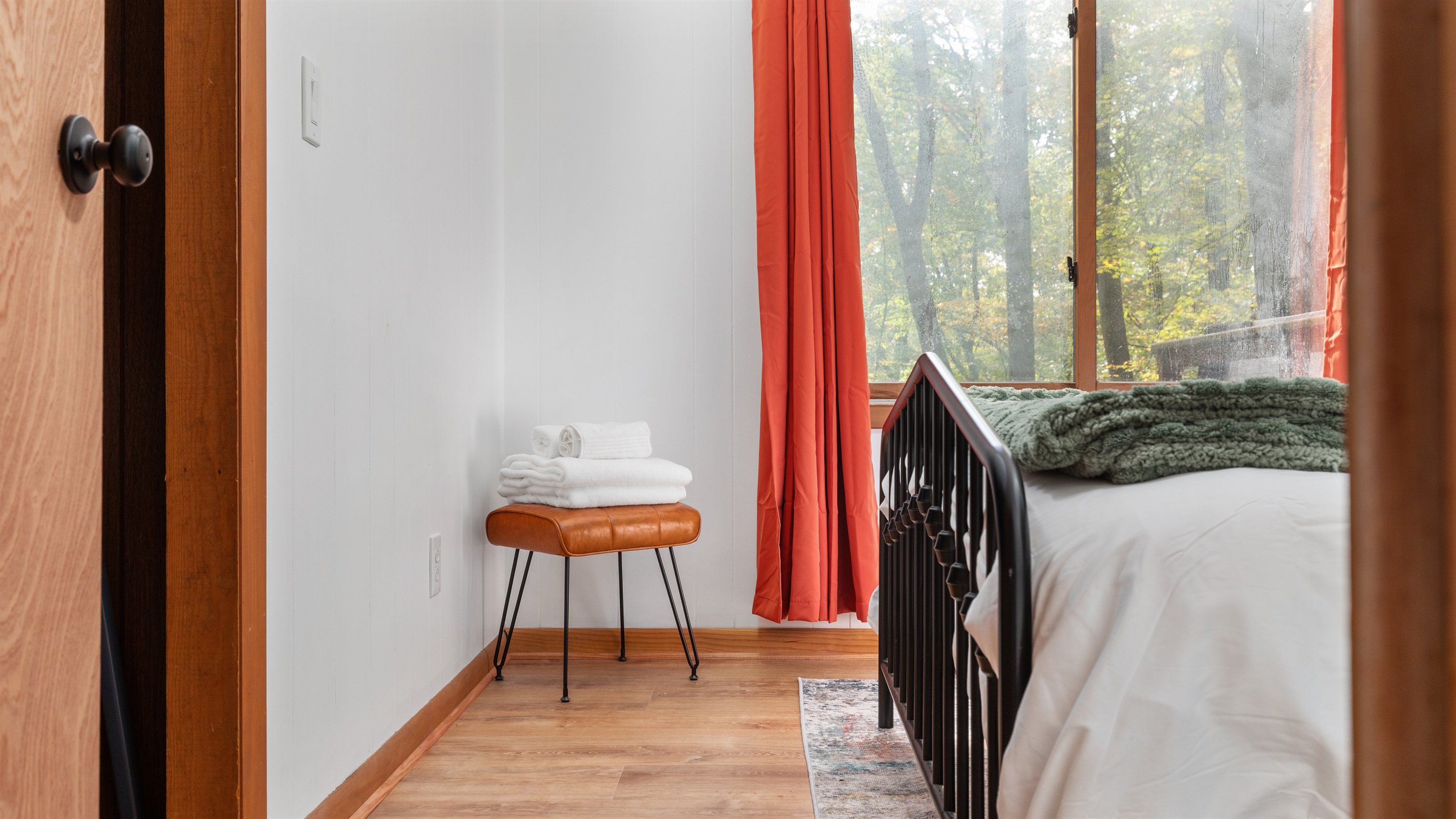 Relax in a comfortable Queen bed with soft linens and towels ready for your stay.
