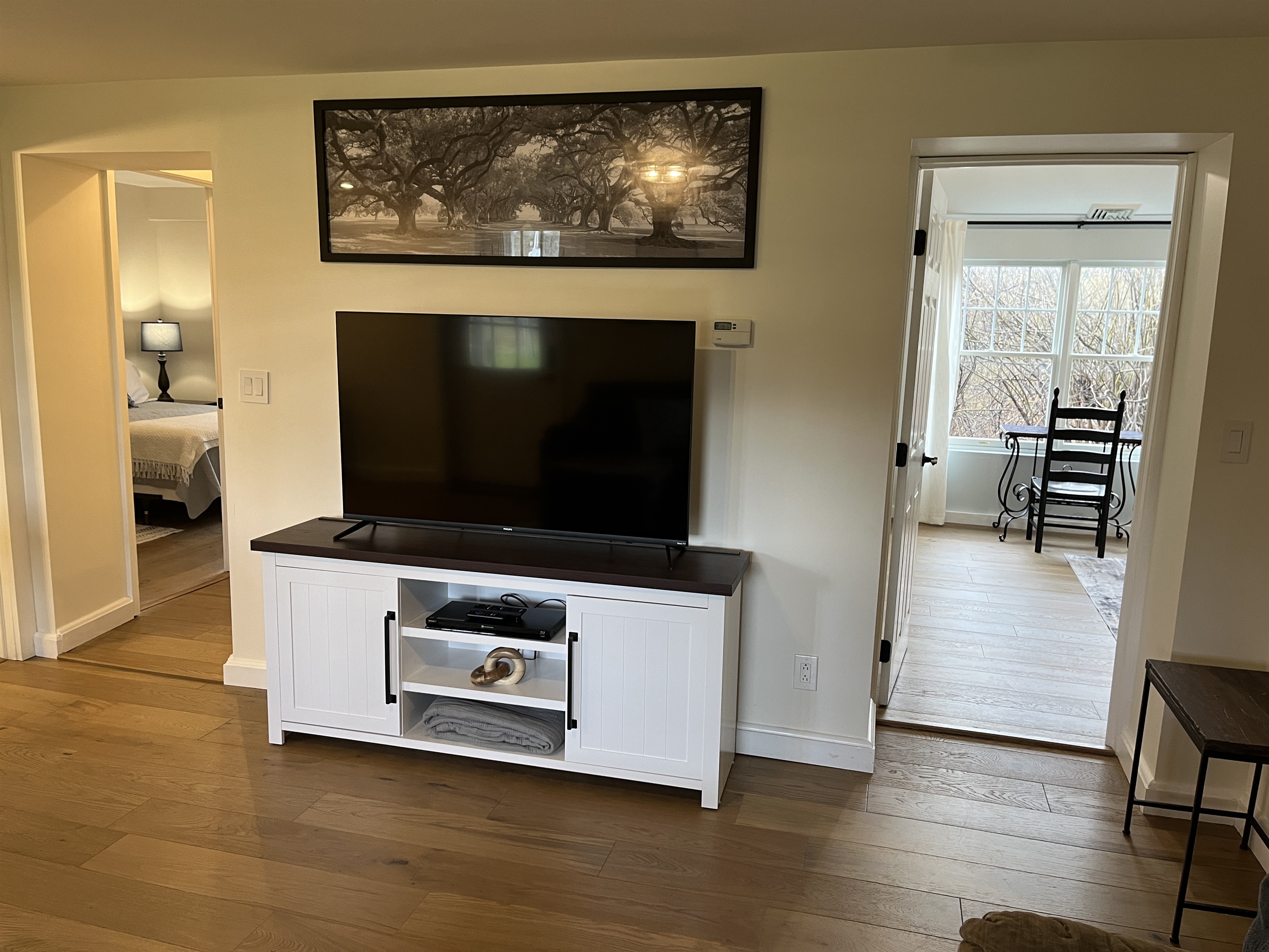 3 bedrooms off living room, 2 doors shown