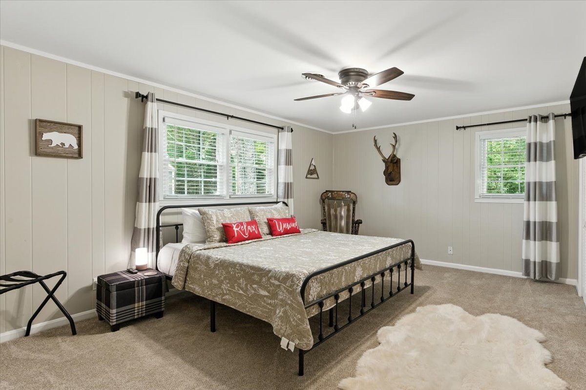 The upstairs king bedroom is comfortable with a closet available for storage.