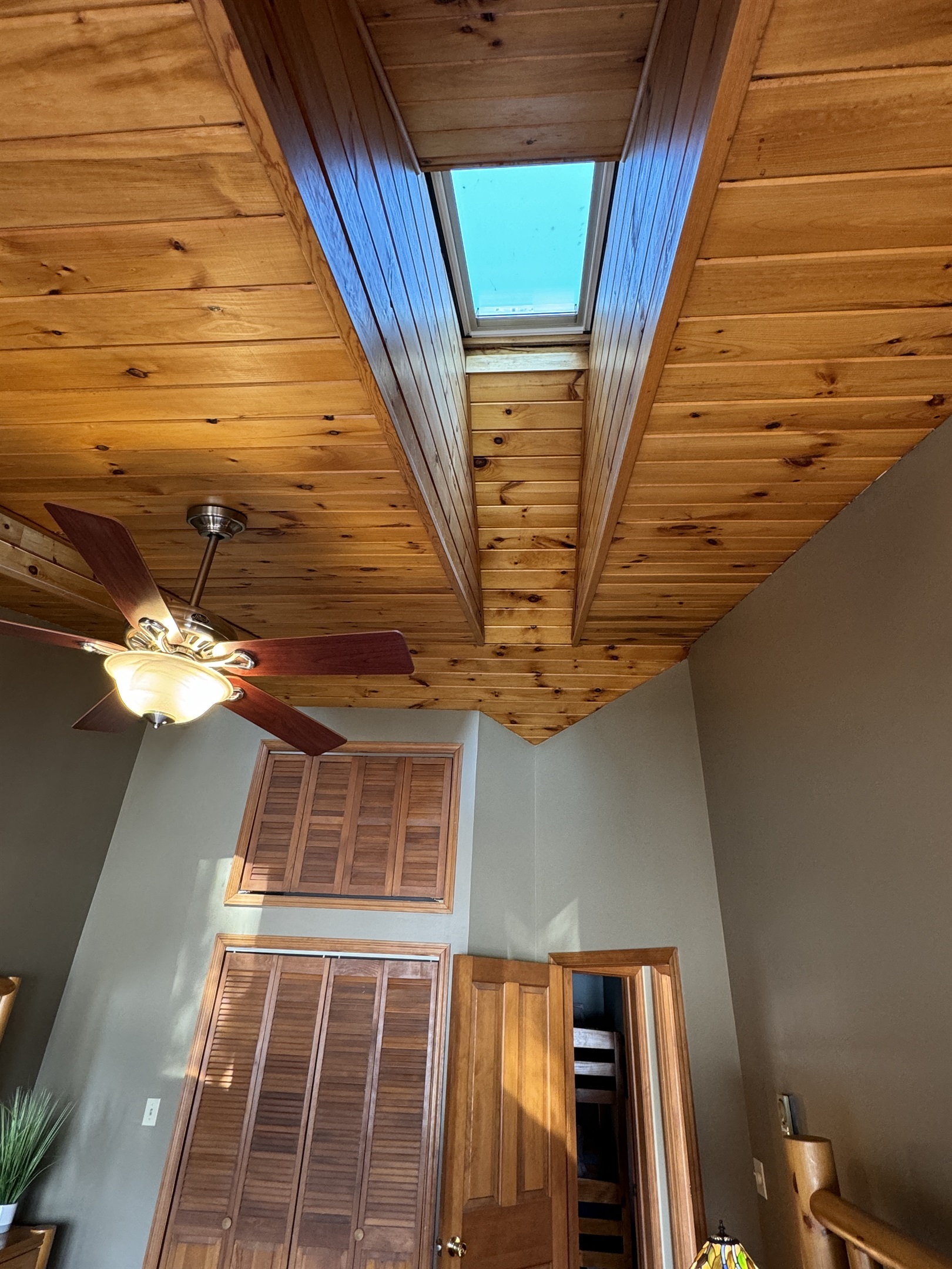 Camp Havon 2nd floor master bedroom with  cathedral ceilings and skylights!