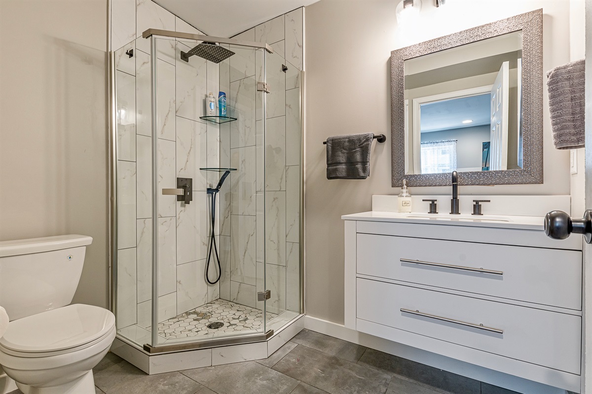 Take a nice hot shower under the rainfall showerhead