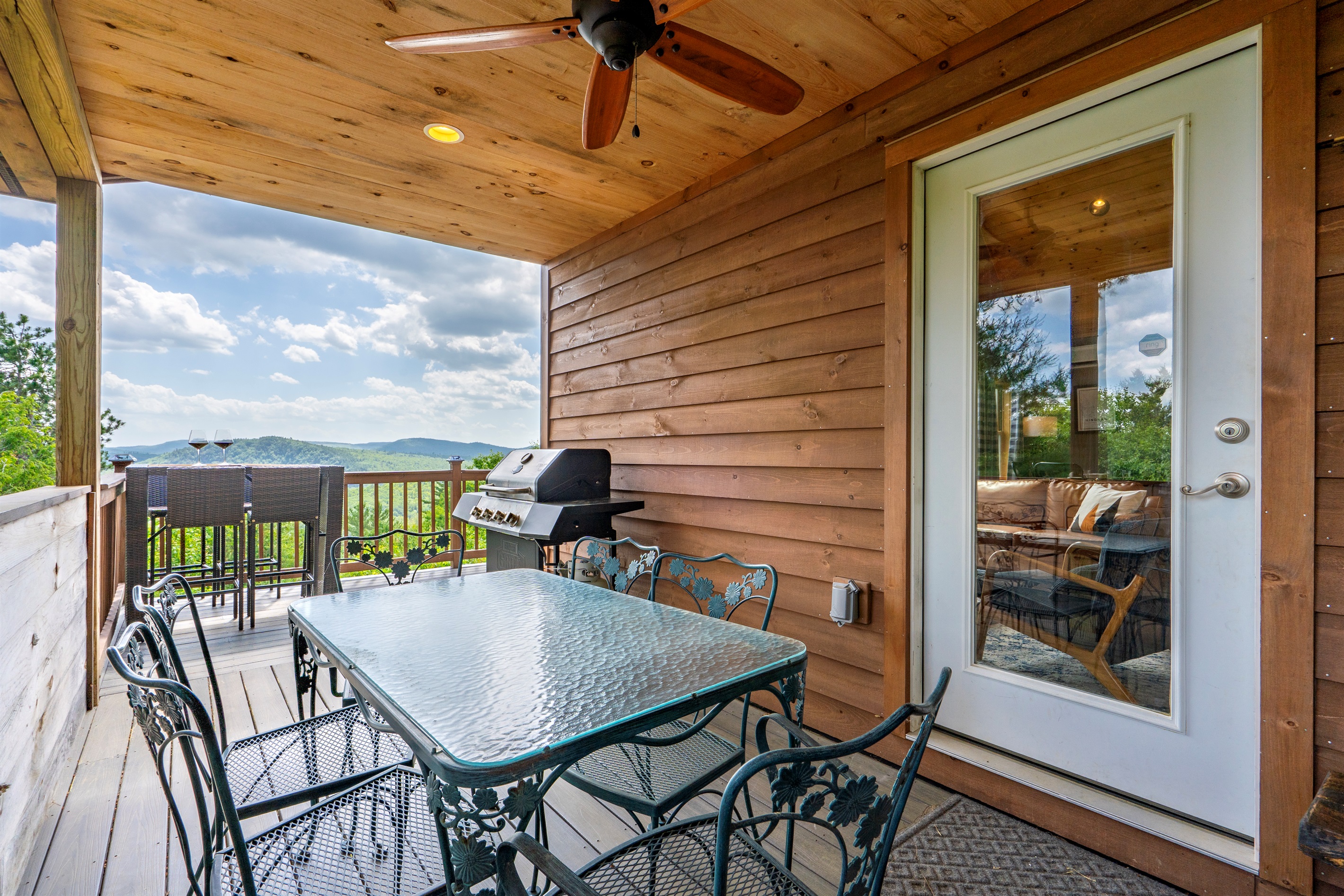 Enjoy al fresco dining on the deck with stunning views.
