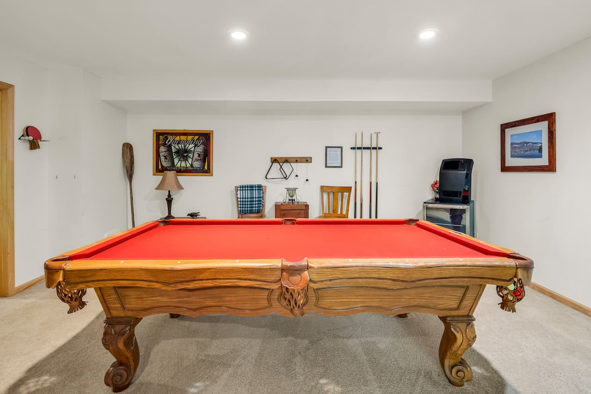 Challenge friends and family to a game of pool in the dedicated game room
