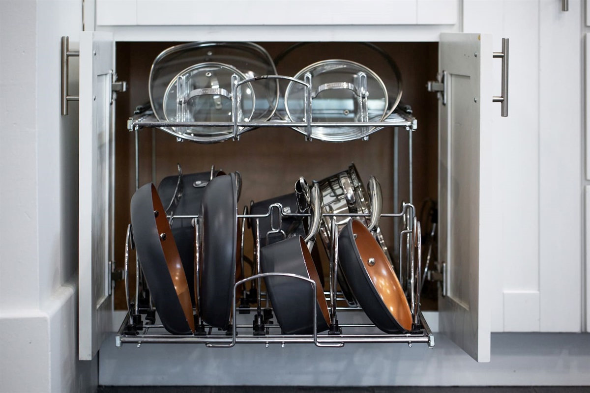 Our kitchen's open shelves celebrate both form and function, displaying cookware essentials.