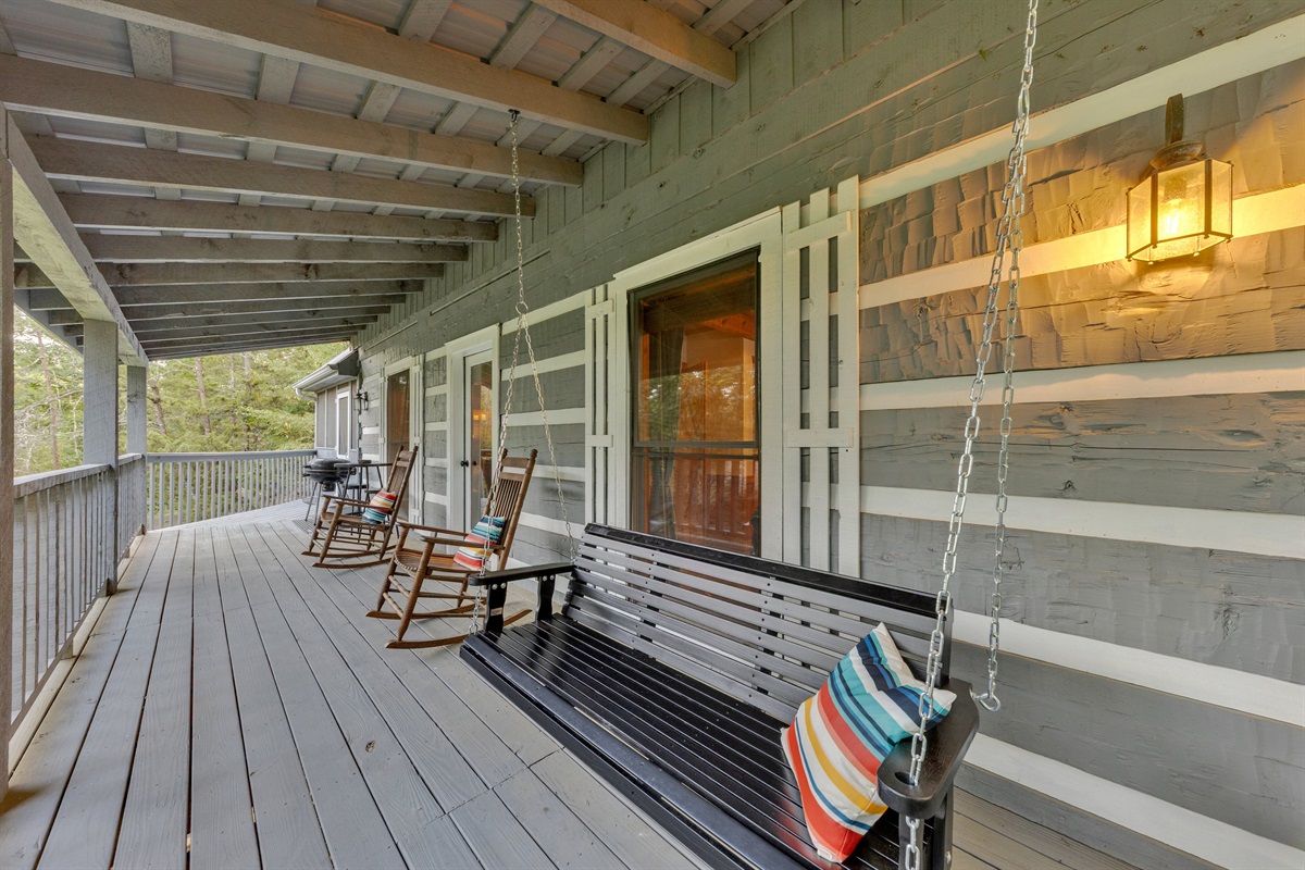 Covered and shaded, this inviting outdoor space is perfect rain or shine