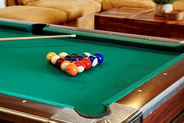 Game Room: Enjoy a friendly game of pool in this vibrant space, perfect for laughter and fun!