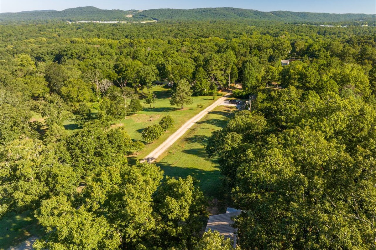 Farmhouse driveway with house in the lower right corner.  View of Hot Springs Valley and Hwy 70