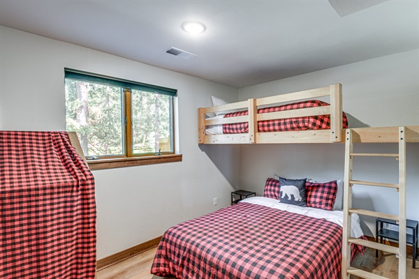 Bunk room featuring twin-over-full bunk and additional sleeping space—great for kids