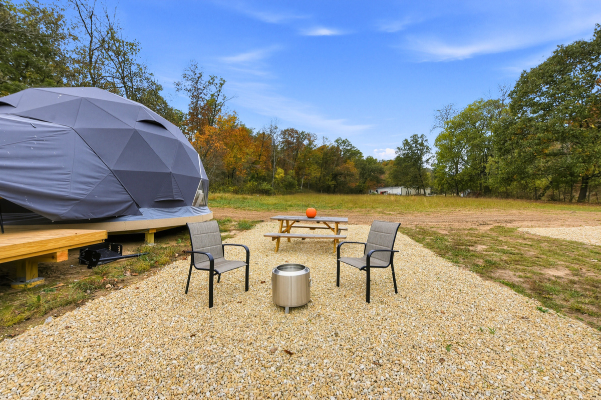 Gather around your outdoor fire pit or enjoy a meal at the picnic table just outside your dome.