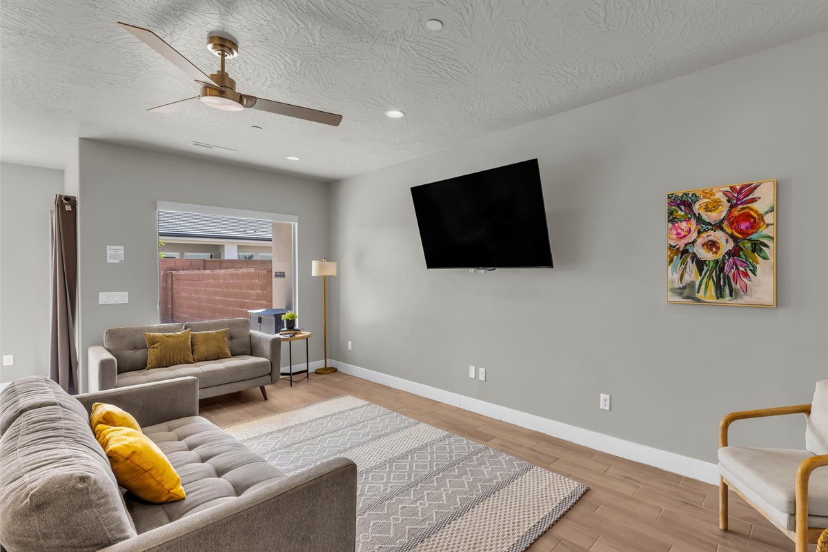 Main Living Room Featuring 65″ Smart TV