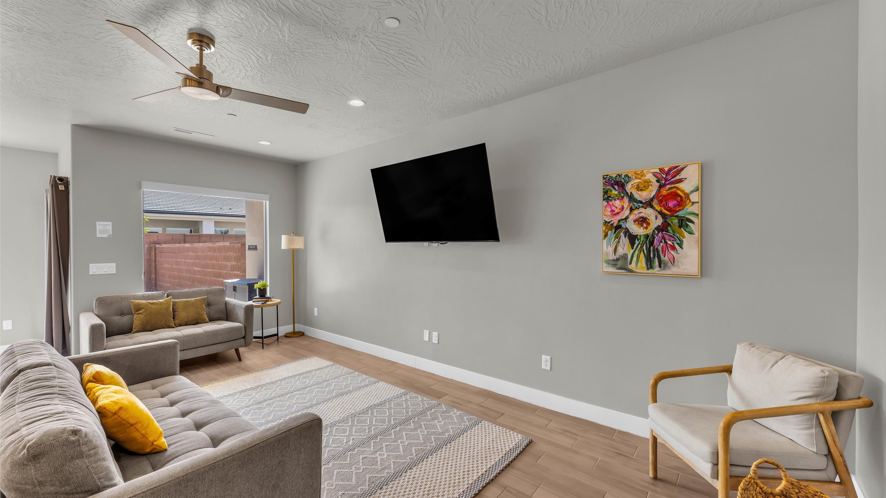 Main Living Room Featuring 65″ Smart TV