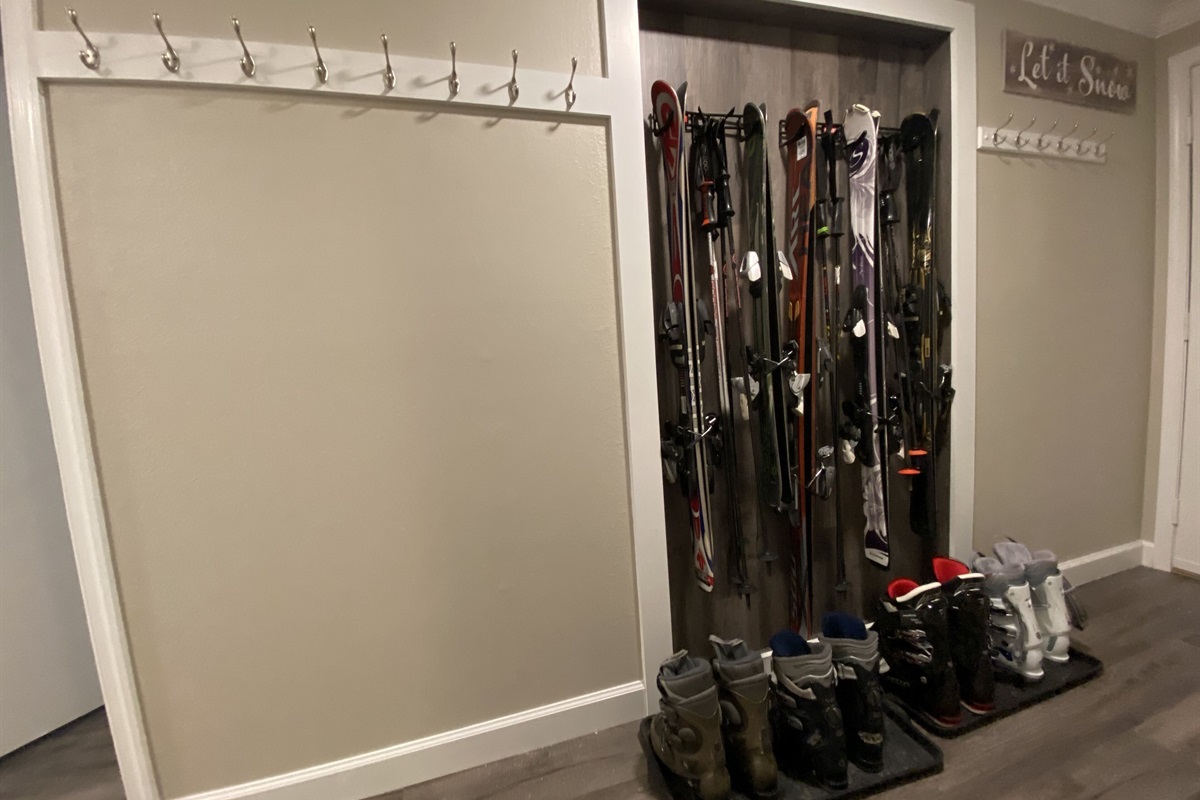 Lots of hooks for coats and gear and dedicated space for skis, boards and boots.