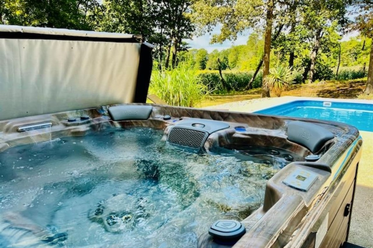 Hot Tub & Pool, just off the dining room patio door