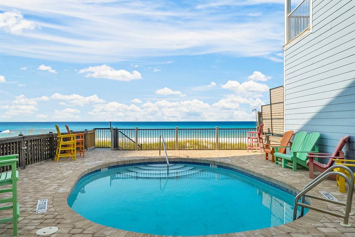 Swim, sun, or stroll: enjoy the shared beachfront pool, sundeck, outdoor shower, and private boardwalk to the sand — plus a shared grill for those perfect cookout nights.