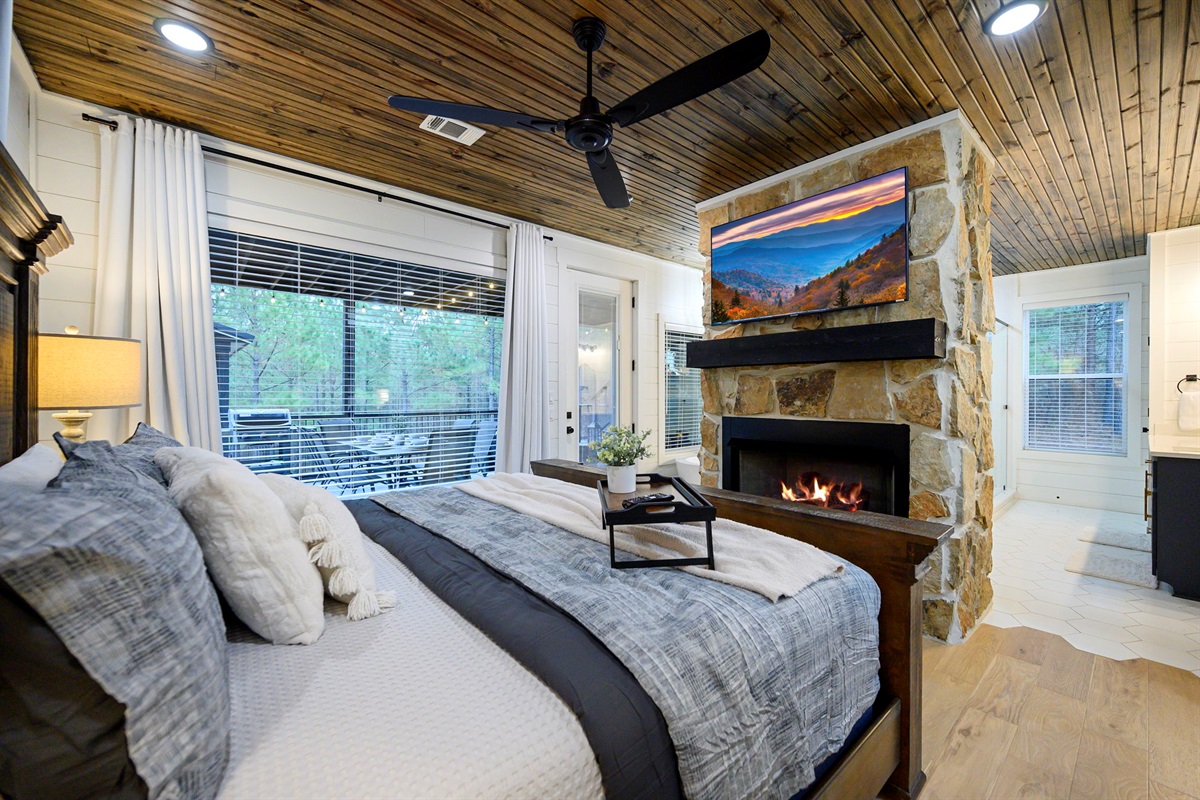 Bedroom 1: Private King Suite with private access to back deck.