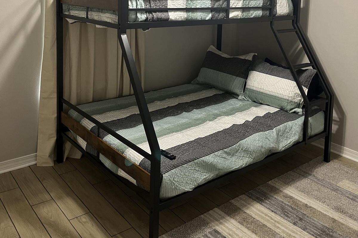 Bunk bed room. Twin on top and full on the bottom. Smart TV for our guests to watch a favorite show.