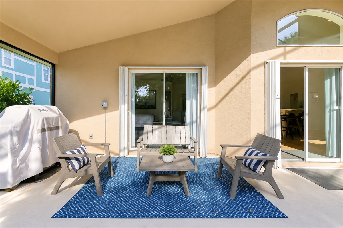 Enjoy the best of indoor-outdoor living with easy access to the pool, grill, and patio lounge