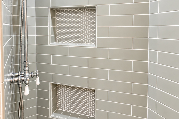 Master bathroom featuring a stylish tiled shower