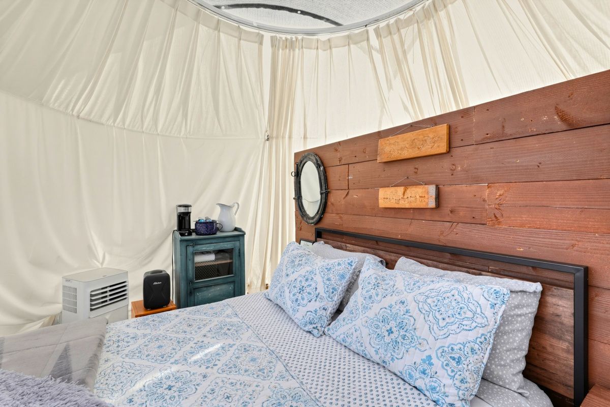 Queen bed and cozy café area inside the dome for a comfortable stay