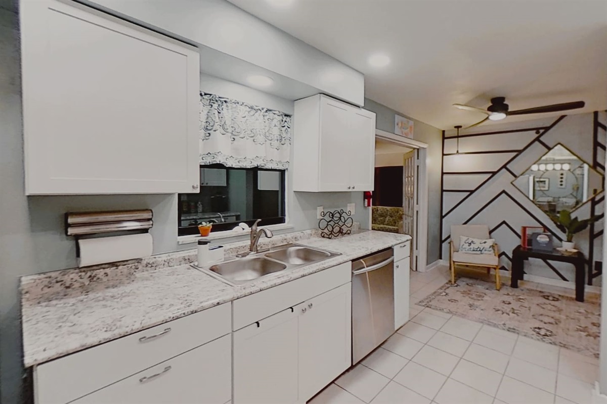 Kitchen, with double sink and dishwasher, dish detergent and dishwasher paks included.