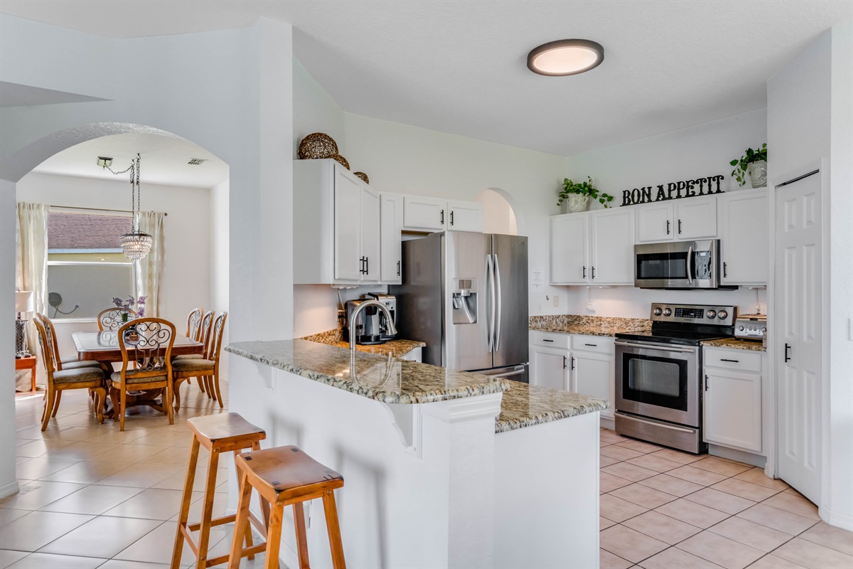 Countertop seating at the kitchen for those on the go!