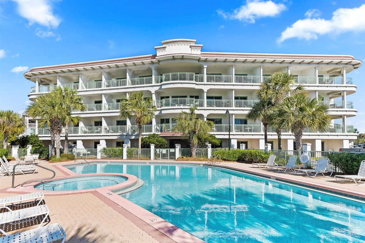 Unwind and rejuvenate with our private pool and hot tub, conveniently located just outside your door.  Spend your days relaxing by the pool, reading a book, or exploring the beautiful beach.
